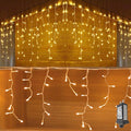 YASENN 300Led Icicle Style String Lights 29.5FT,Update Connectable 8 Lighting Modes with Timer Icicle Lights for Home Garden Outdoor Indoor Eave Decor (Warm White LED White Cable)