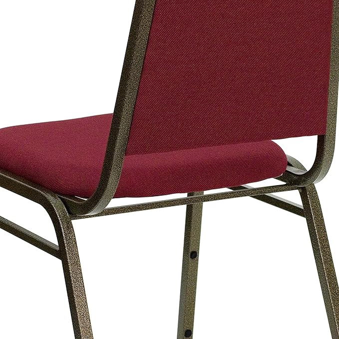 EMMA + OLIVER Trapezoidal Back Fabric Upholstered Stackable Banquet Chair, Multipurpose Stacking Chair with Padded Seat and Back, Burgundy/Gold