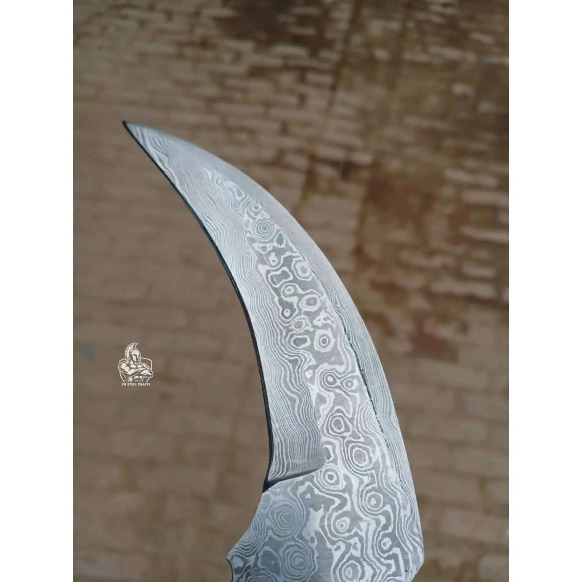 Karambit Knife with Black horn and Stainless steel handle.